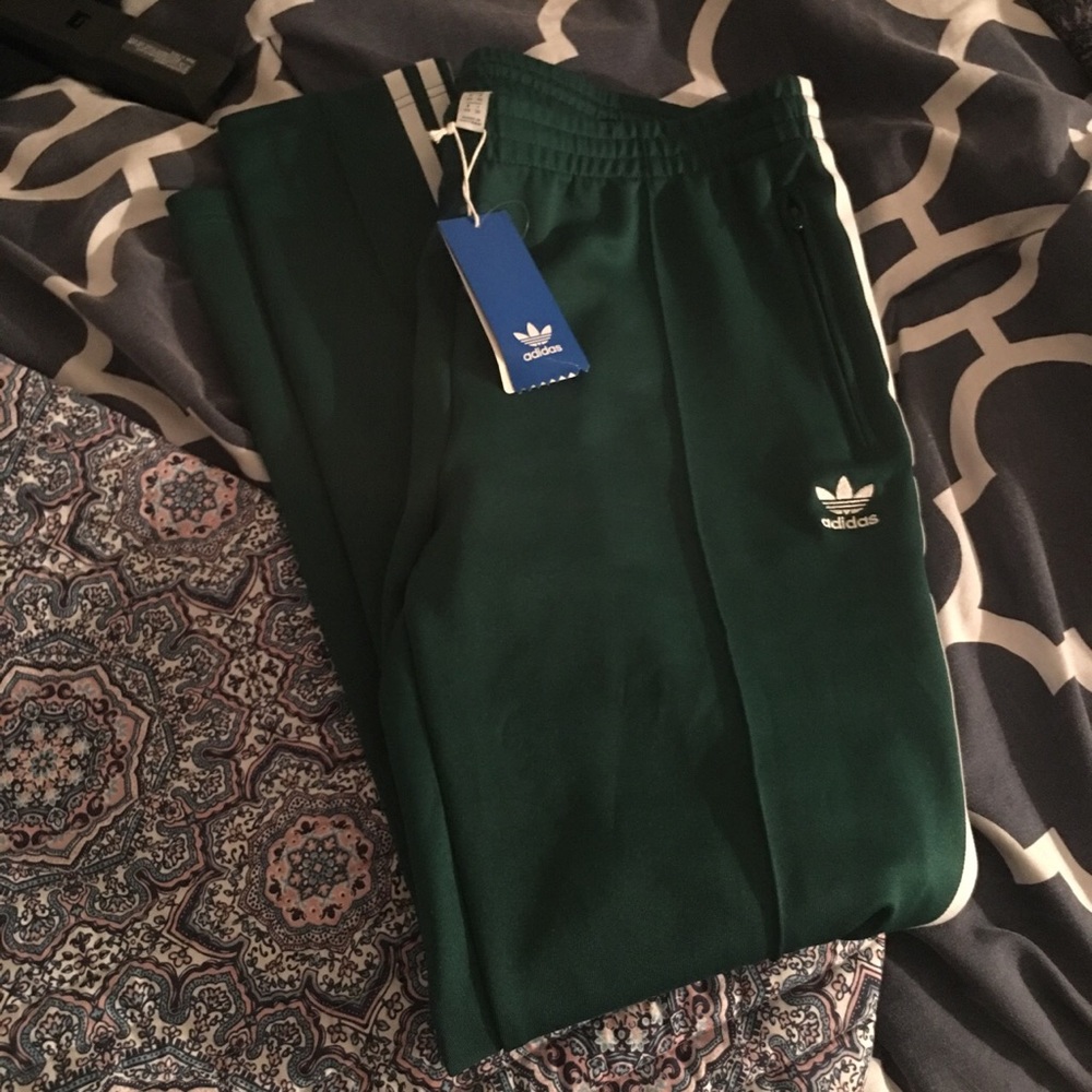 Green Adidas trackpants
